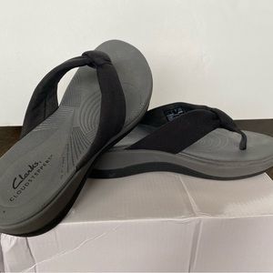 Ladies Clark brand black flip-flops with wedge heel size 8